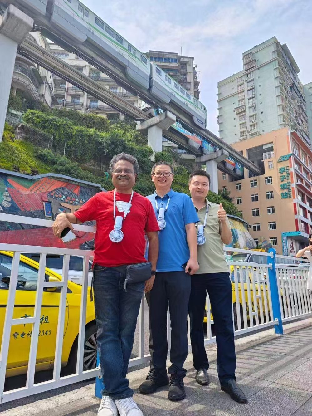 Anjia travellers at the Chongqing riverside skyline